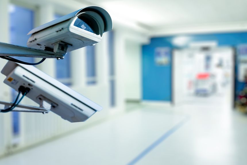 The CCTV Security Camera operating in hospital blur background.
