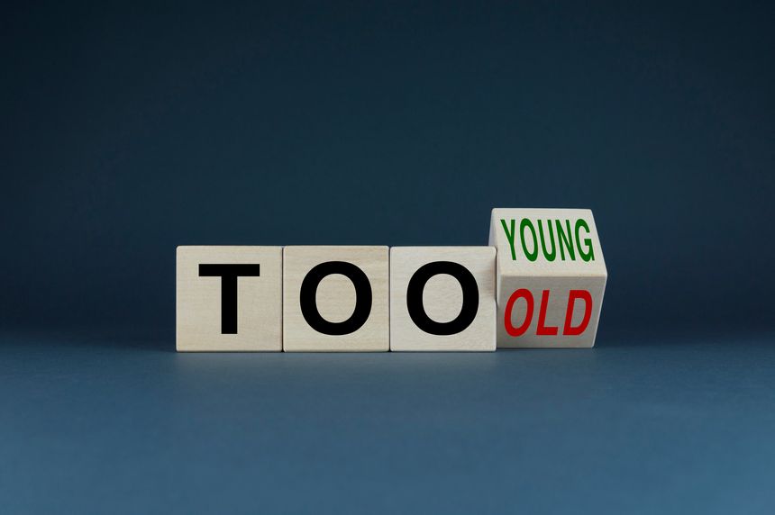 Too young or too old. Cubes form words Too young or too old. Concept of age discrimination - social problem
