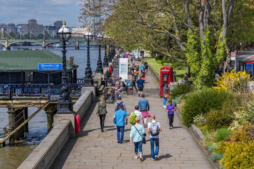 View of Lambeth riverside promenade where many people come to walk on a sunny day on May 04, 2018 in London