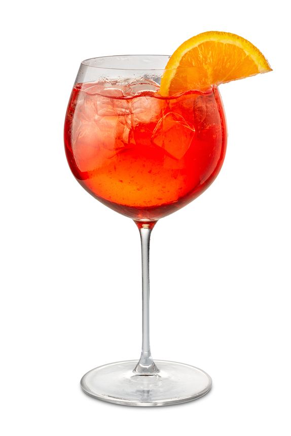 Alcoholic Spritz cocktail in goblet glass with orange slice Isolated on White with clipping path included