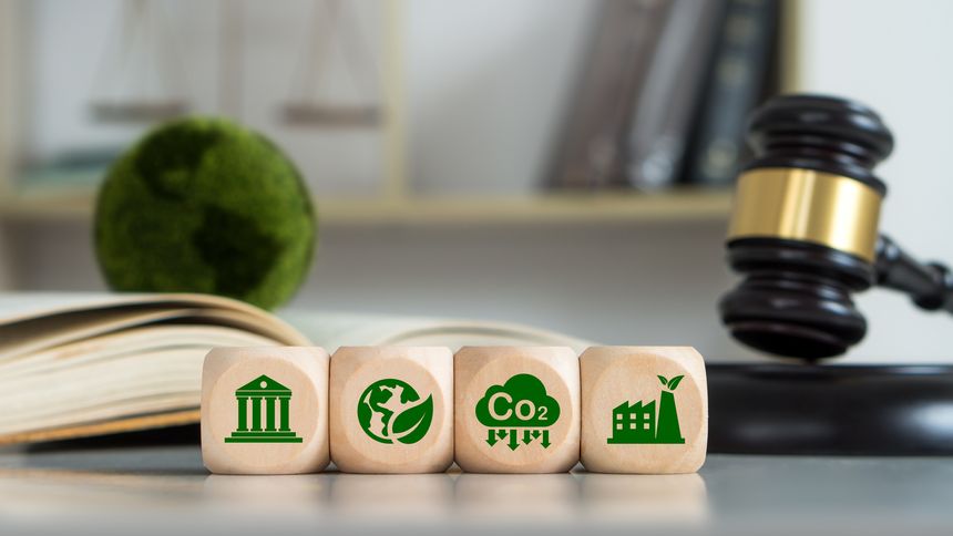 Law international environmental concept.Wooden cubes with a decarbonization icon and green icon.Law for environmental regulation.Sustainable environment concept.