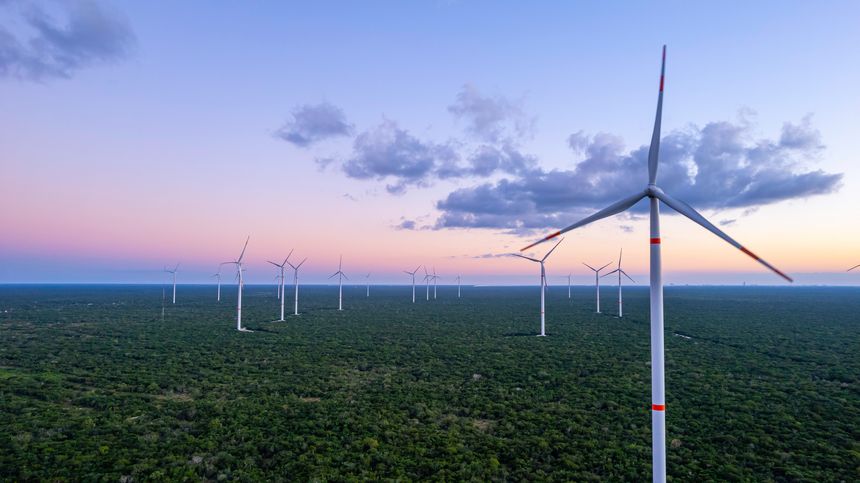 Green technology, wind farm at sunset