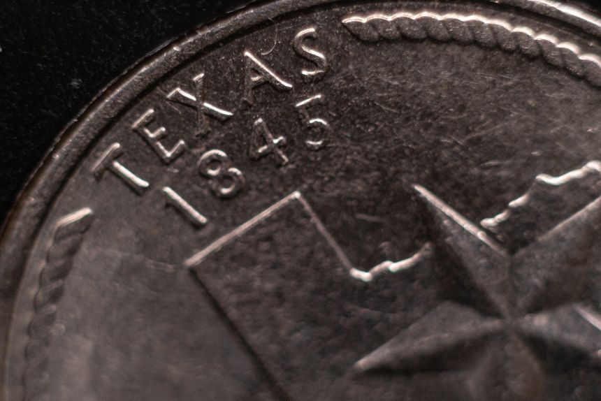 Texas State Quarter Coin U.S. America elections Democracy Patriotism .USA State Name Money Economy Coin Macro Photography.Values of historical events and politics