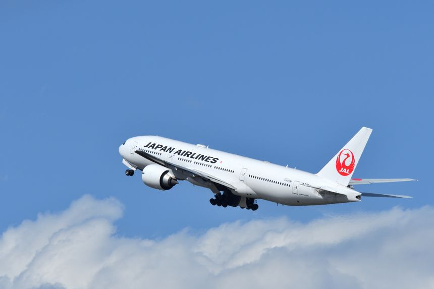 Tokyo, Japan - April 18, 2021:Japan Airlines (JAL) Boeing B777-200ER (JA703J) passenger plane.