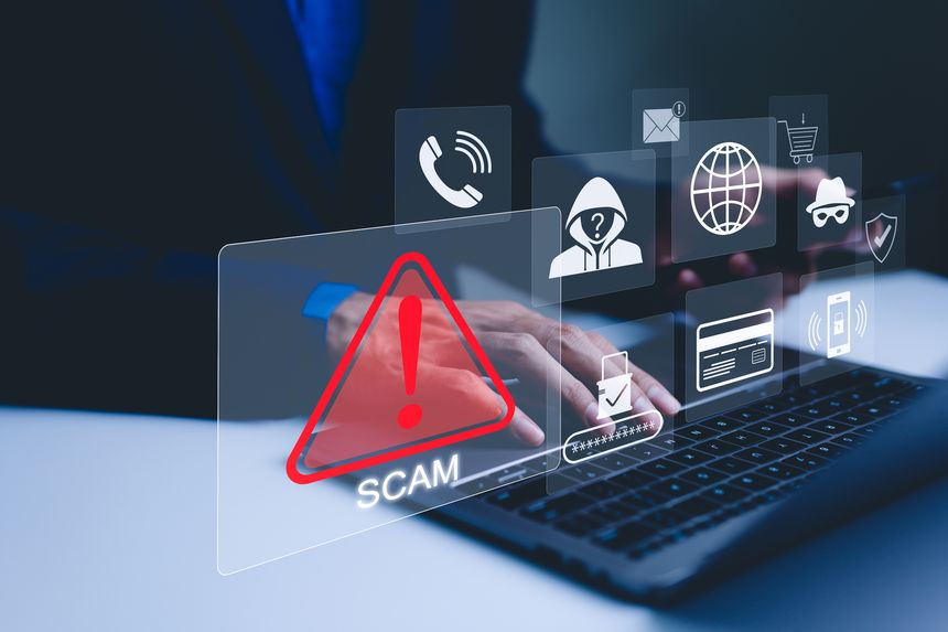 Scam Alert Warning with Cybersecurity Icons. A person using laptop, warning sign for scams with icons representing online threats, phishing, and cybersecurity. Unknown person, suspicious scammer,