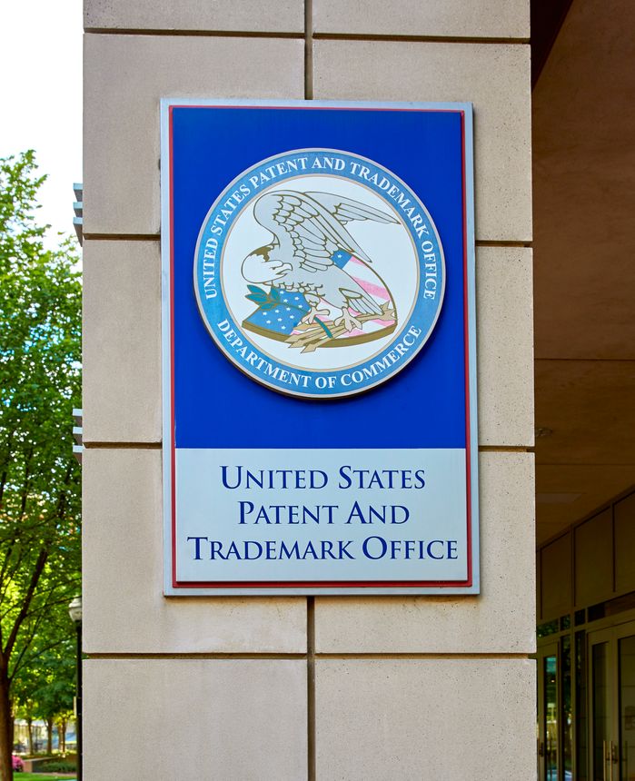 Alexandria, Virginia, USA - September 8, 2022: United States Patent and Trademark Office Emblem on pillar near building entrance