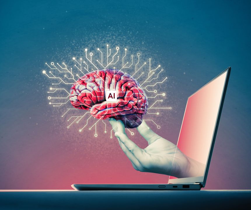 Digital hand holding a brain with AI icon.