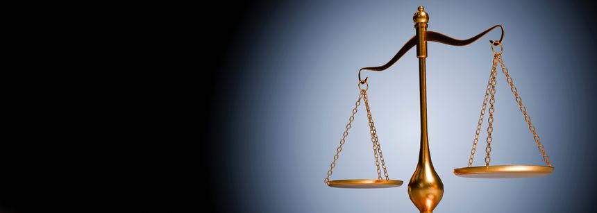 A close-up of a gleaming golden balance scale against a gradient background, representing impartiality and legal judgment