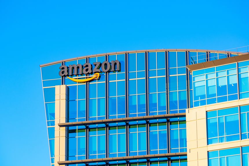 Amazon logo, sign its signature orange smile on the glass exterior of Amazon.com office in Silicon Valley - Sunnyvale, California, USA - 2021