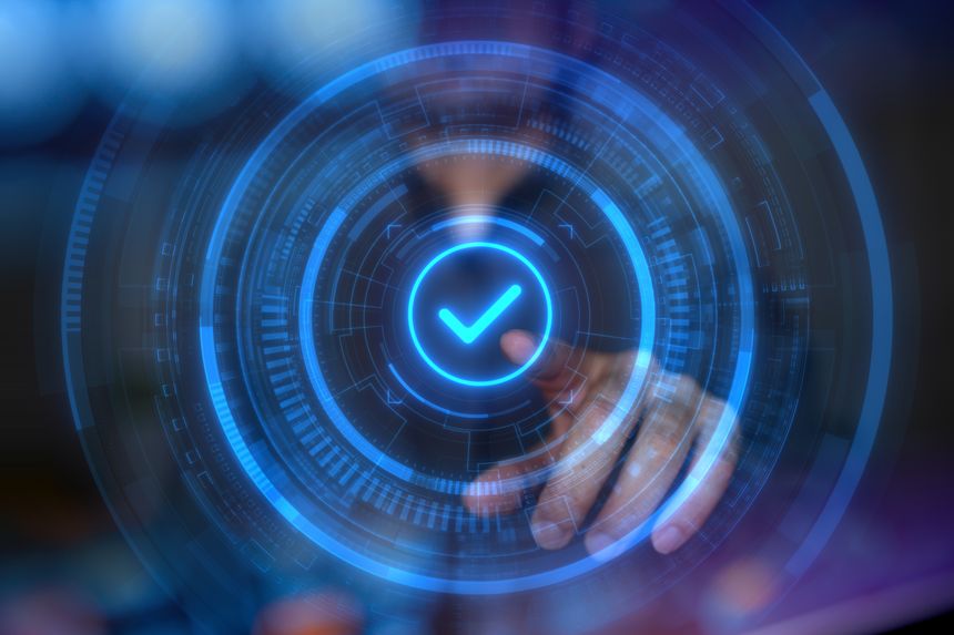 Man touching holographic checkmark icon. Concept of quality control, assurance, online approve, certification, approved decision, positive choice, top quality, satisfaction and customer service.