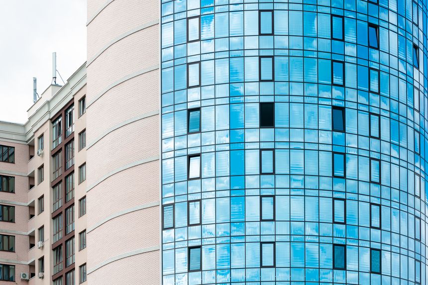 building modern architecture facade elliptic shape with panel and glass exterior material living district town