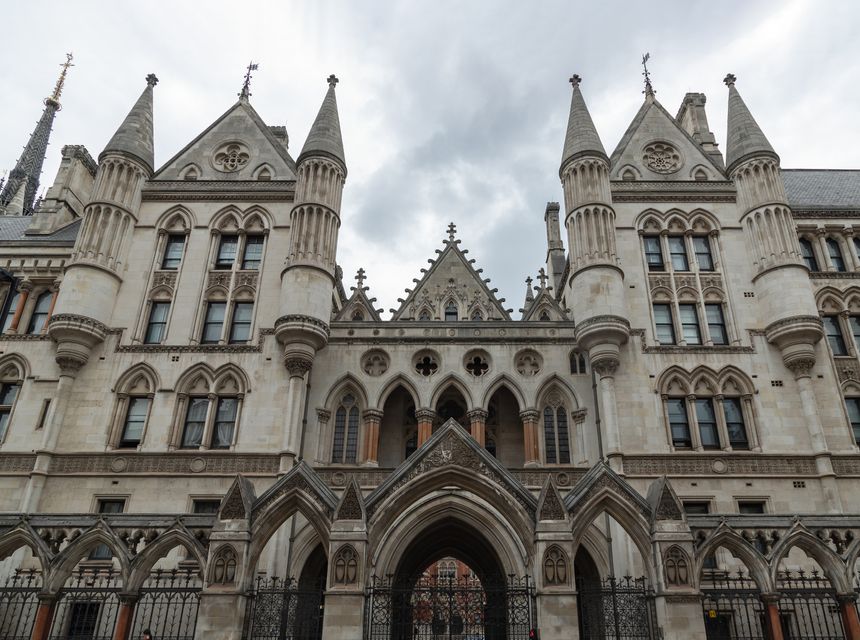 London, UK - Jul 27, 2025 - Victorian Gothic Revival architecture of the Royal Courts of Justice on the Strand, Serves as the center for many important court hearings in the United Kingdom, use it as your Wallpaper, Poster and Copy space, Selective focus.