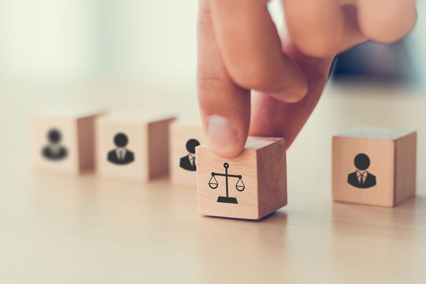Compliance with employment laws and regulations, labor laws concept. Laws aim to protect workers from discrimination, harassment, unsafe working conditions and unfair treatment.