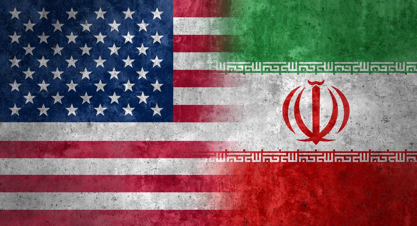 Iran US Clash as a conflict with Tehran and Washington fighting a war concept as unrest in Iran as diplomatic problems in the middle east crisis.