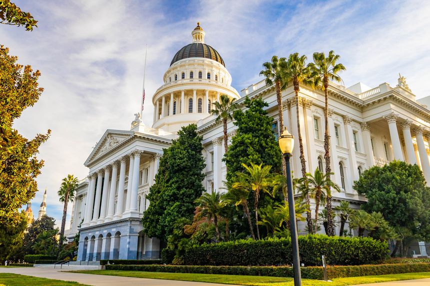 Close up view of the California State Capitol building exterior in Sacramento California on a sunny day showing neoclassical architecture and Capitol dome details
