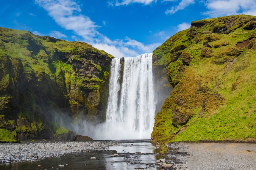 Skogafoss waterfall in south east Iceland. Amazing Icelandic landscape and touristic destination.