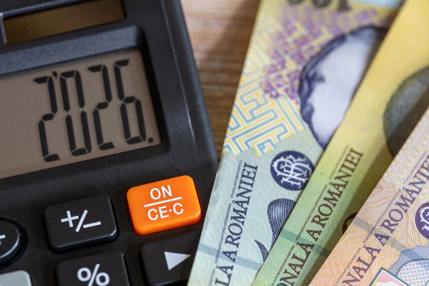Romania money. Finances 2026. Business and economic concept. Symbol of the Romanian leu. The year 2026 displayed on a calculator. Financial background. Close up