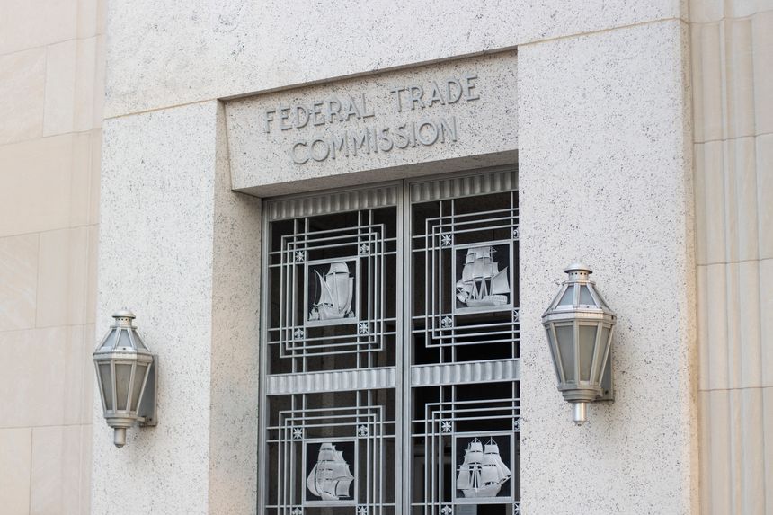 Washington, DC, USA - June 21, 2022: One of the entrances to the Federal Trade Commission Building in Washington, DC, that serves as the headquarters of the Federal Trade Commission (FTC).