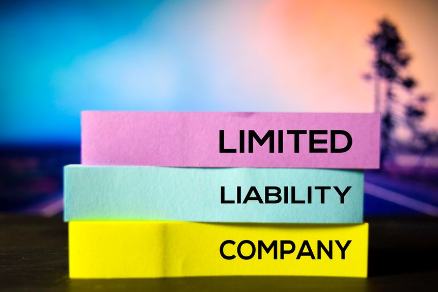 Limited Liability Company on the sticky notes with bokeh background