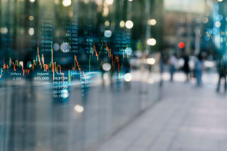 stock market graph line with blue blur city street background