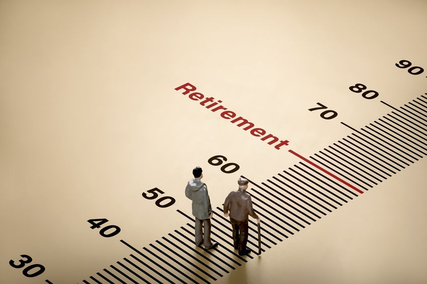 Word retirement age scale on background with little dolls of elderly businessman and young man. Concept of retirement planning finance, health insurance and living a happy and secure retirement life.
