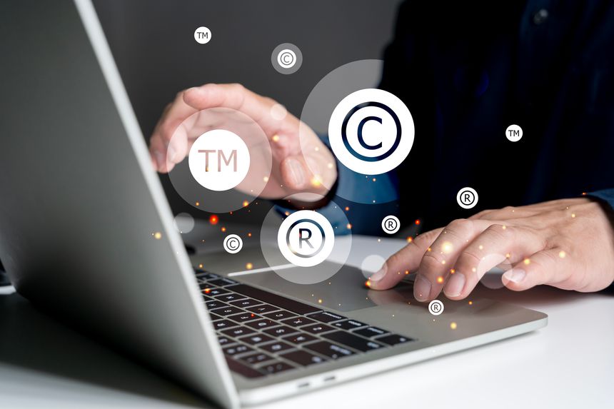 Copyright protection concept. Registration or registration for trademark, Register trademark. Businessman holding copyright icon and logo on virtual screen.