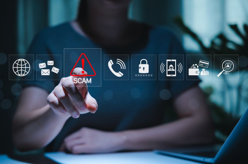 Scam alert warning. cybersecurity concept. Woman interacts warning sign for scams with icons representing online threats, phishing, and cybersecurity. unknown person, suspicious scammer, fraud, fake,