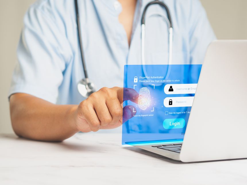 A doctor's fingerprint on the virtual screen is required to access the system. Touchscreen login interface. The concept of cyber security and personal data protection
