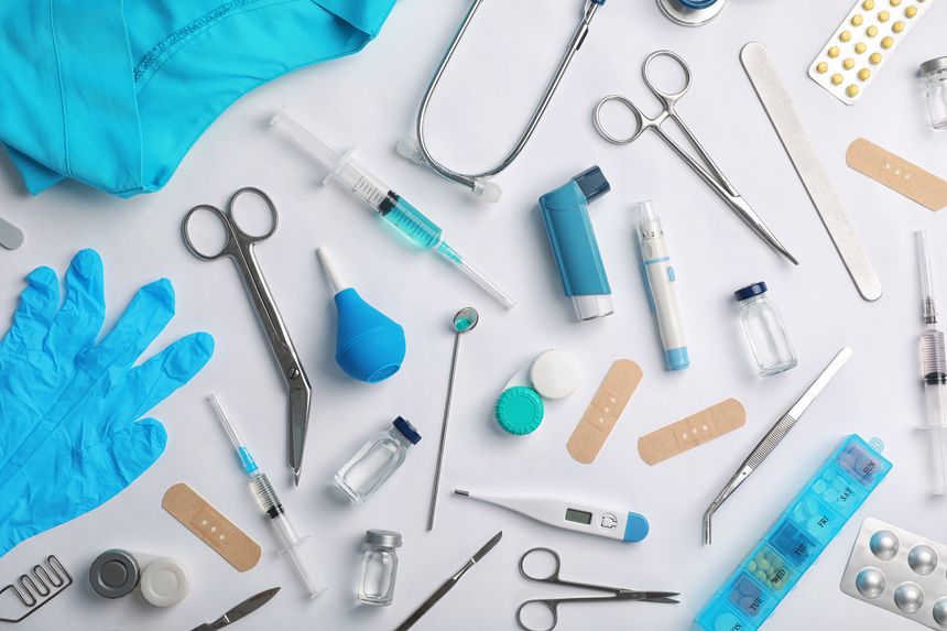 An arrangement of medical supplies, symbolizing healthcare, medicine, and well-being. Useful for illustrating various medical themes and health-related topics.