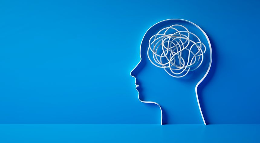 3D silhouette of a head with white tangled rope or cord inside symbolizing mental complexity and confusion on blue background - 3d illustration