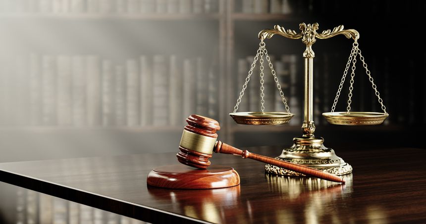 Legal concept: Scales of justice and and the judge's gavel hammer as a symbol of law and order.