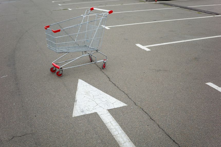 supermarket parking trolley with a large metal shopping cart