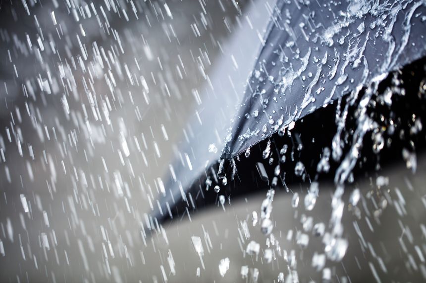 Rain on umbrella background, weather forecast, climate, raining and environmental concept