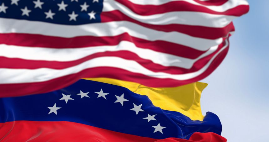 Venezuela and US national flags waving in the wind on a clear day. Diplomatic tension. 3d illustration render. Selective focus