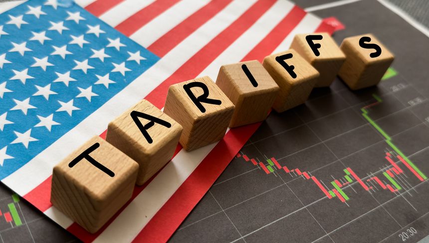 Container tariffs word on Flag of the United States of America background. Tariff US trade war with Canada and Mexico. High quality photo
