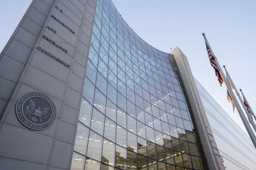 Washington, DC, USA - June 24, 2022: Low angle view of the U.S. Securities and Exchange Commission (SEC) headquarters building in Washington, DC, in the evening.