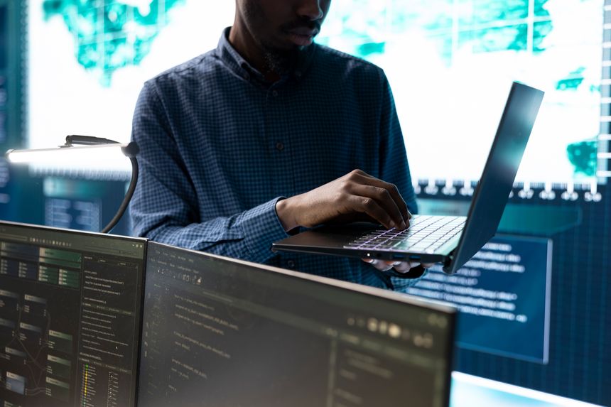 Cyber security team conducting cyber surveillance and threat detection in a governmental agency. Hackers working on cybercrime and malware prevention, data breach protection.