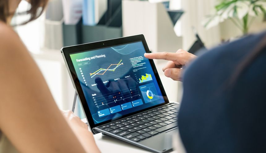 close up hand team of financial discussion fintech technology planning, analyzing digital financial data and strategy in a modern office