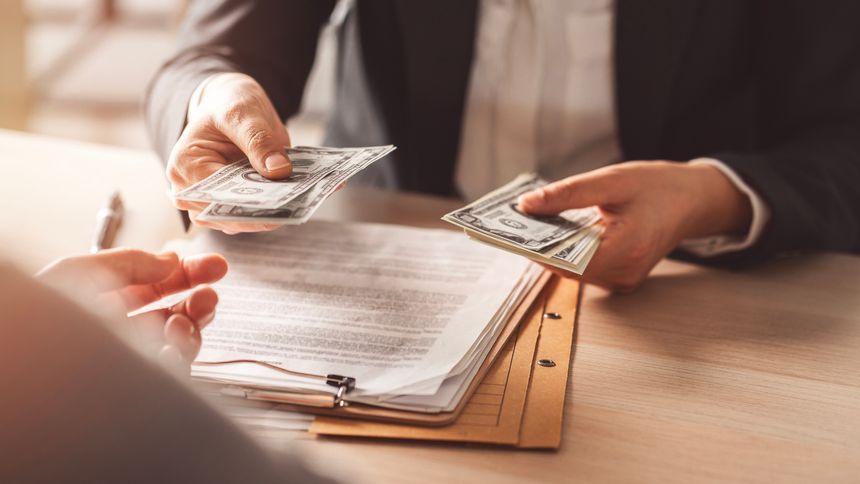 Paying or bribing the signing of an contract agreement