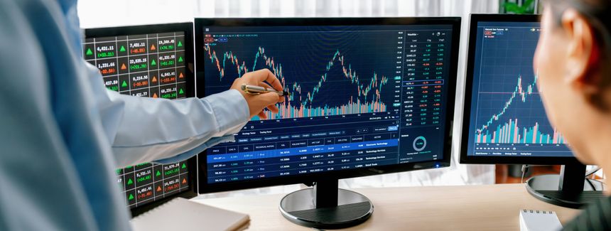 Expert successful businessman present stock market investment to smart beautiful investor during pointing the growth stock market graph. Cooperative trader discuss about investment. Burgeoning.