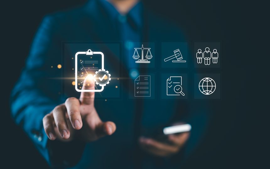 Compliance in business concept. Stay in line with business policies. Businessman touching compliance icon on virtual screen, ensuring the enforcement of laws, standards and regulations.