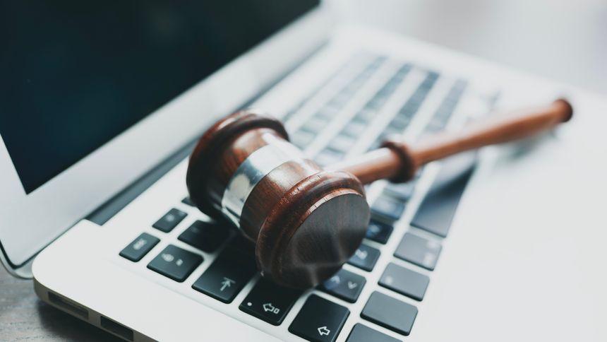 Gavel on a computer keyboard