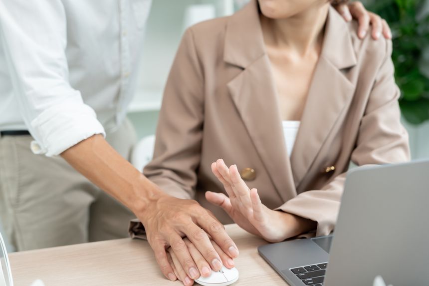 Manager or senior sexually harassed a female colleague by touch her hand. Sexual harassment in office. feel anxious and stressed from being harassed. molest, assault, inappropriate, discrimination