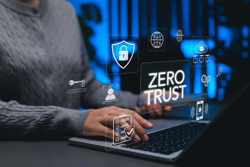 Zero trust cybersecurity and data protection concept. Person using laptop with icons of locks, networks, identity verification, symbolizing zero trust security model, digital data protection strategy