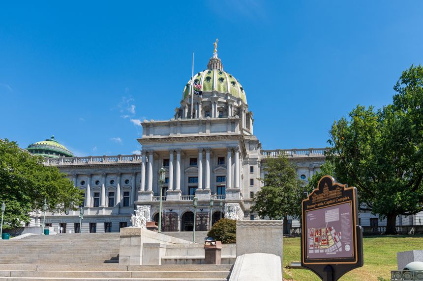 Harrisburg, PA, USA - August 31, 2025: The Pennsylvania Capitol Building, with its distinctive green dome, is the main building of the Capitol Complex.