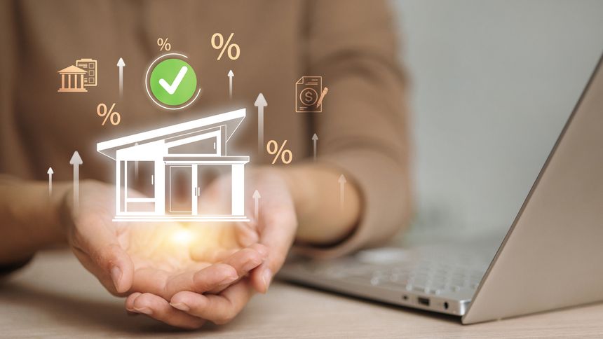 Hands holding a holographic house with green check and percent signs, symbolizing mortgage approval, home loan interest rates, refinancing options, property insurance, and real estate finance with banking.