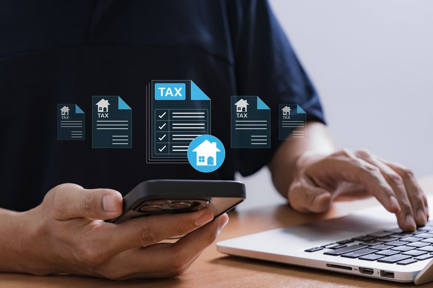 Digital property tax filing and real estate management concept with man using smartphone and laptop to manage housing tax forms, showing mobile access, document checklist, and online submission