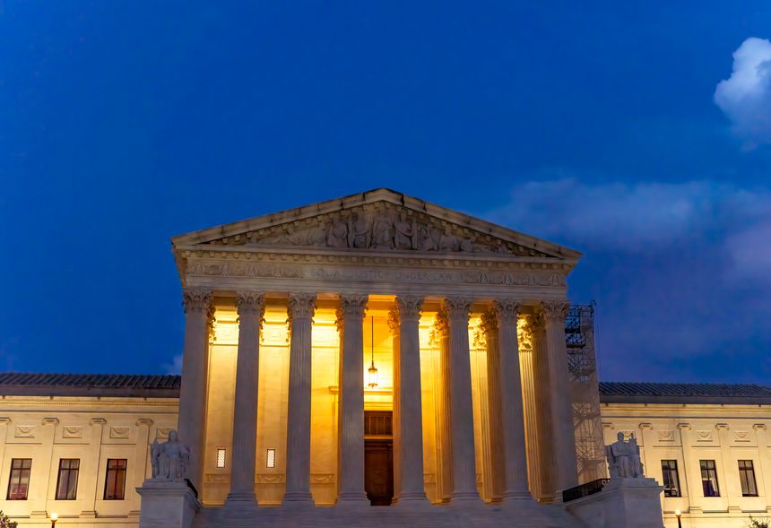 US Supreme Court Illuminated Lights Capitol Hill Washington DC. Highest Court in the United States with nine Justices appointed by the President.