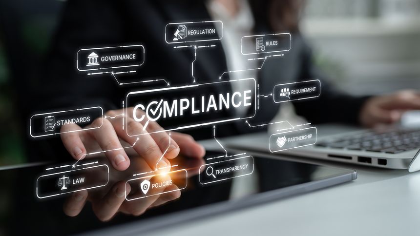A business professional interacts with a digital interface showcasing key compliance concepts, emphasizing the importance of governance, regulation, and transparency in modern organizations.