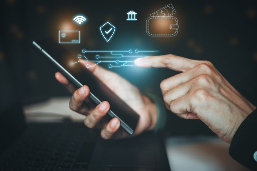 Hand of people using smart phone, Thin-line credit card with shield and checkmark symbolizing financial security icon or mobile payments.